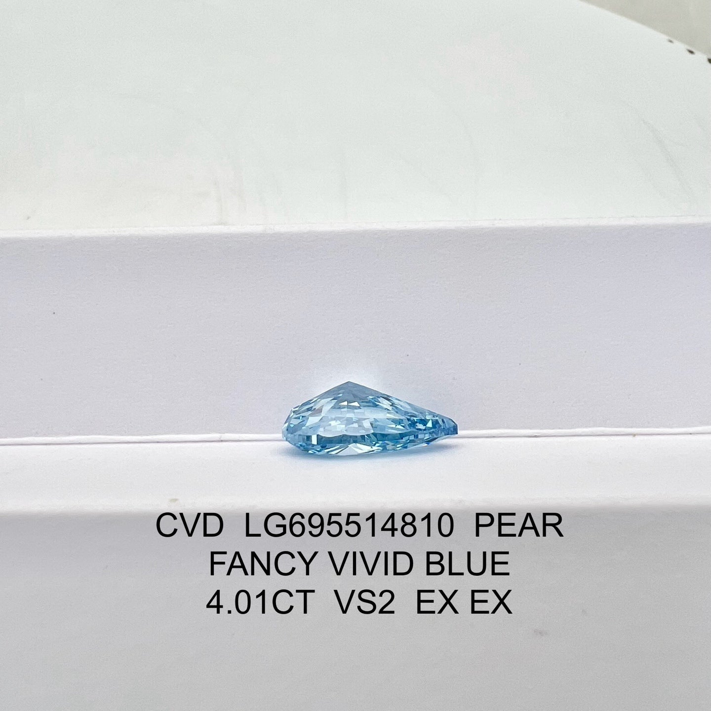 Diamant synthétique de 4,01 carats, taille poire, bleu vif fantaisie VS2 CVD 2EX