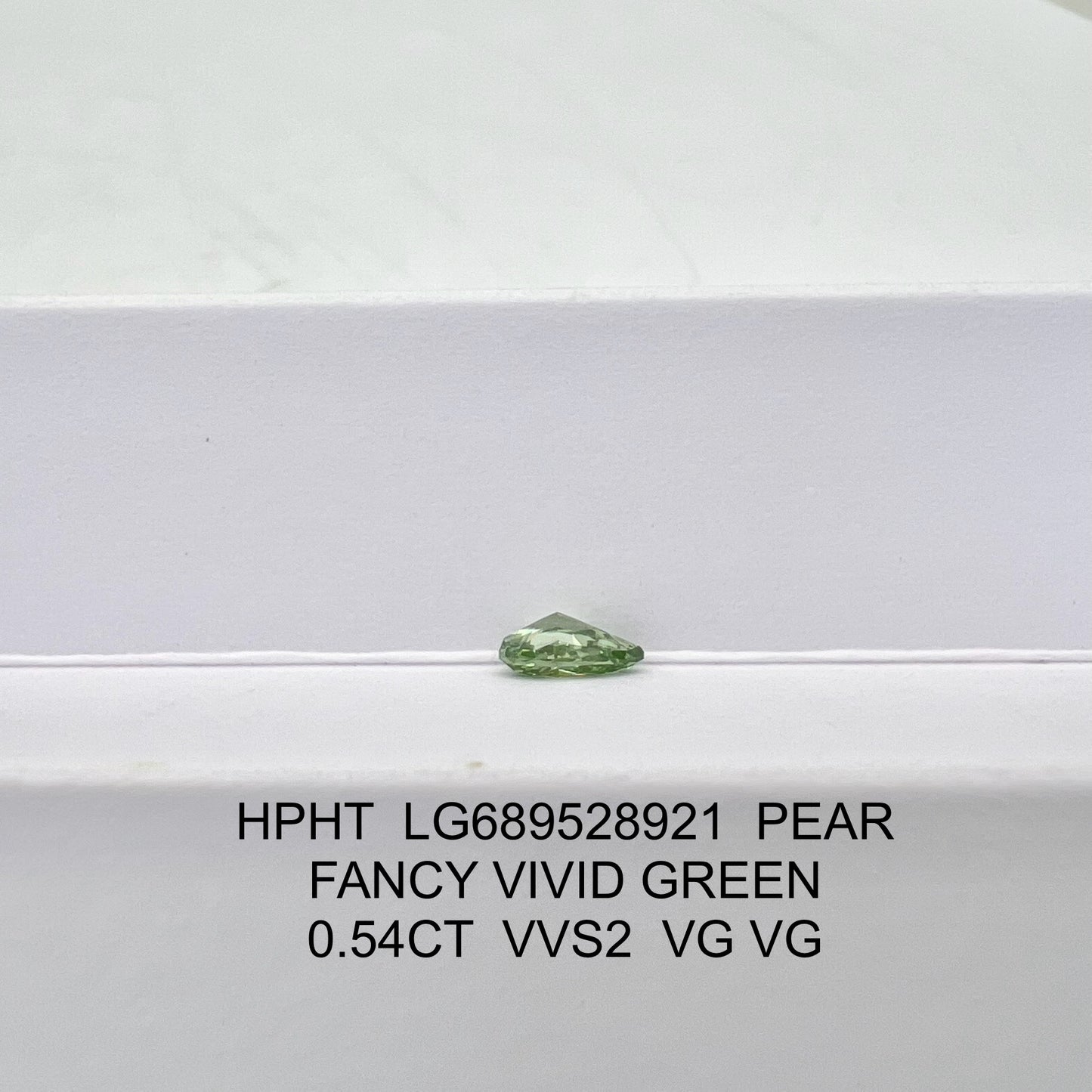 Lab Grown Diamond Fancy Vivid Green Pear 0.54 Carat 2VG HPHT VVS2 IGI Certified
