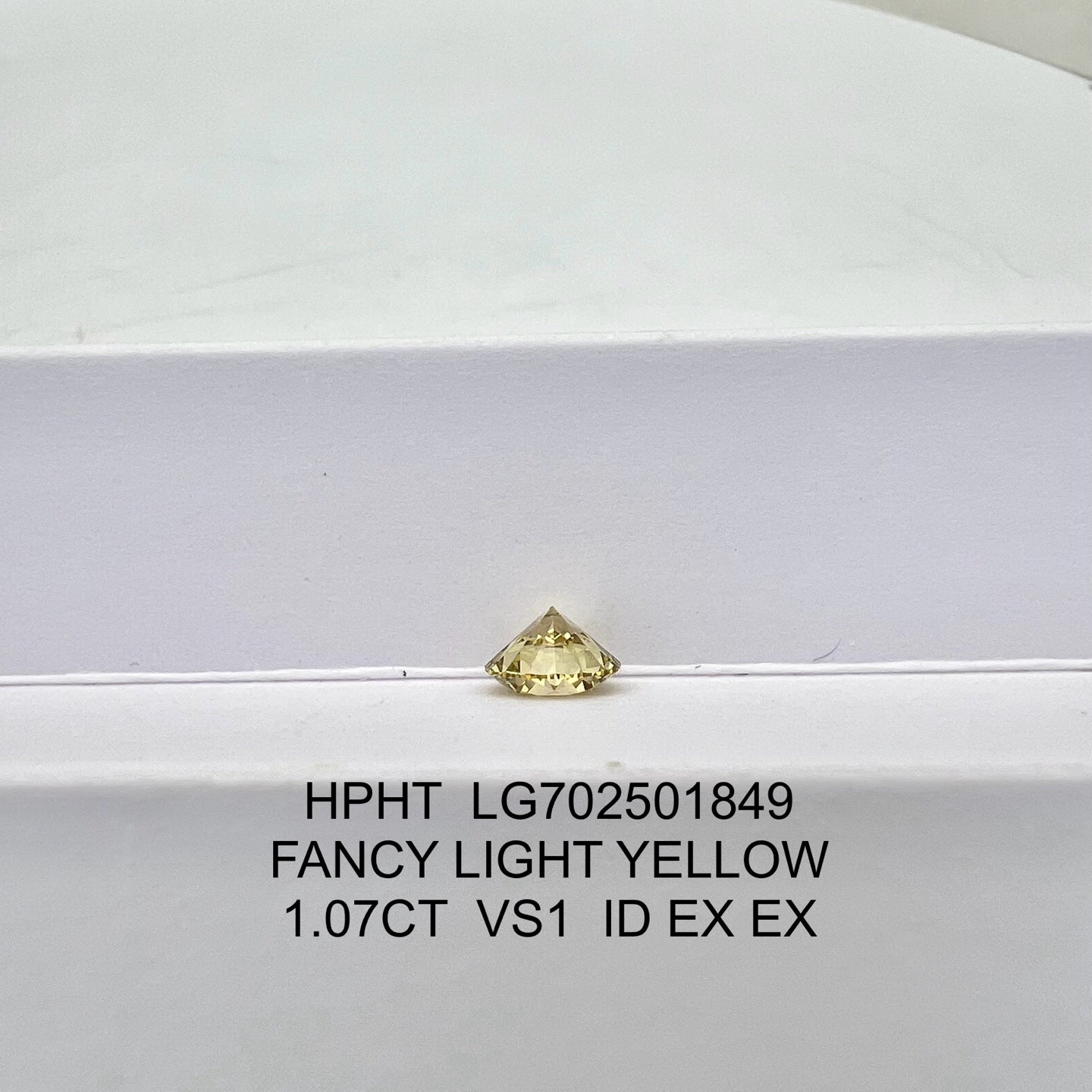 Lab Grown Round Diamond Fancy Light Yellow 1.07 Carat ID 2EX HPHT VS1 IGI Certified
